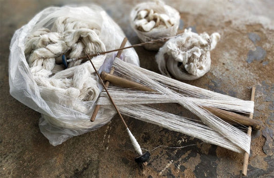 image shows eri silk cocoons being woven
