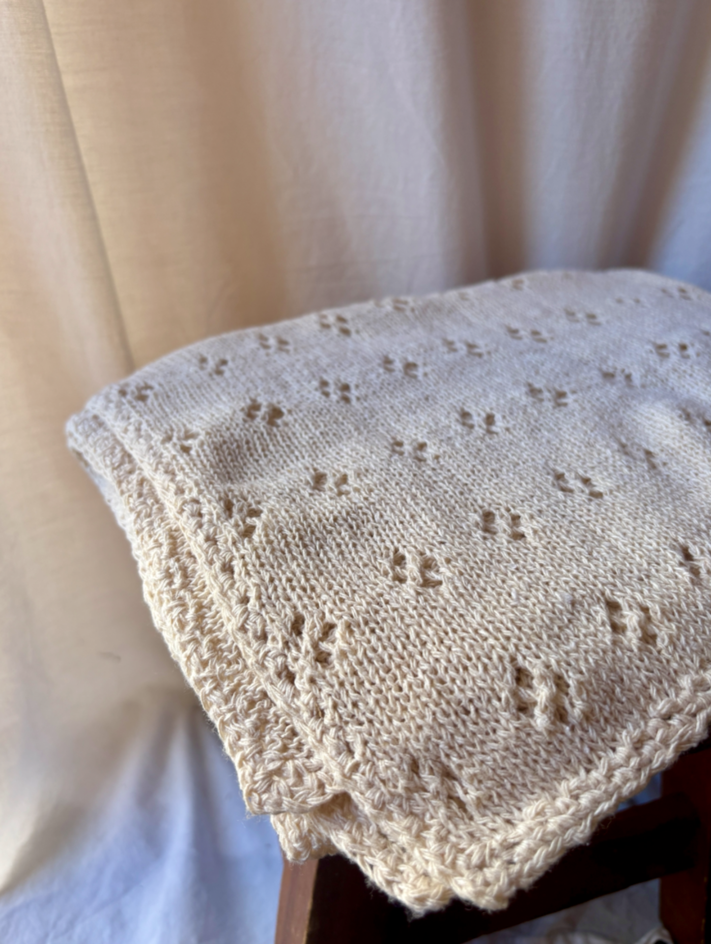 image shows silk organic creme blanket swaddle