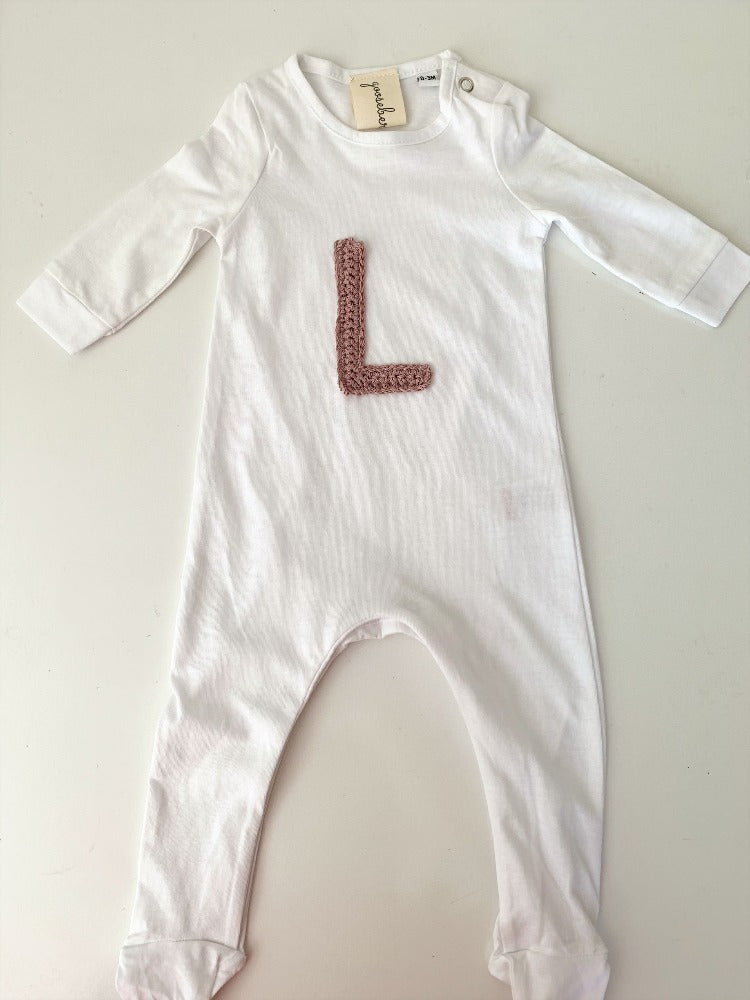 Image shows a personalised organic cotton romper