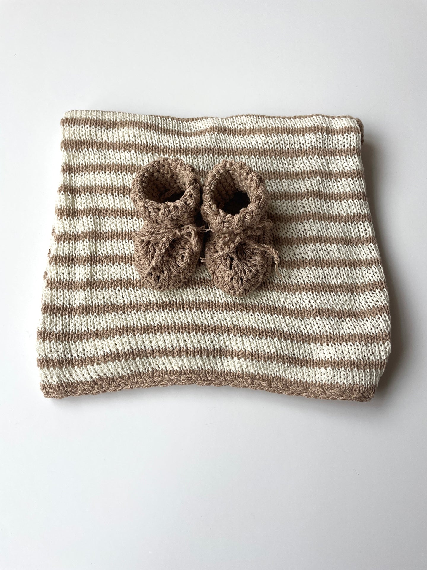 neutral striped organic cotton knitted baby blanket