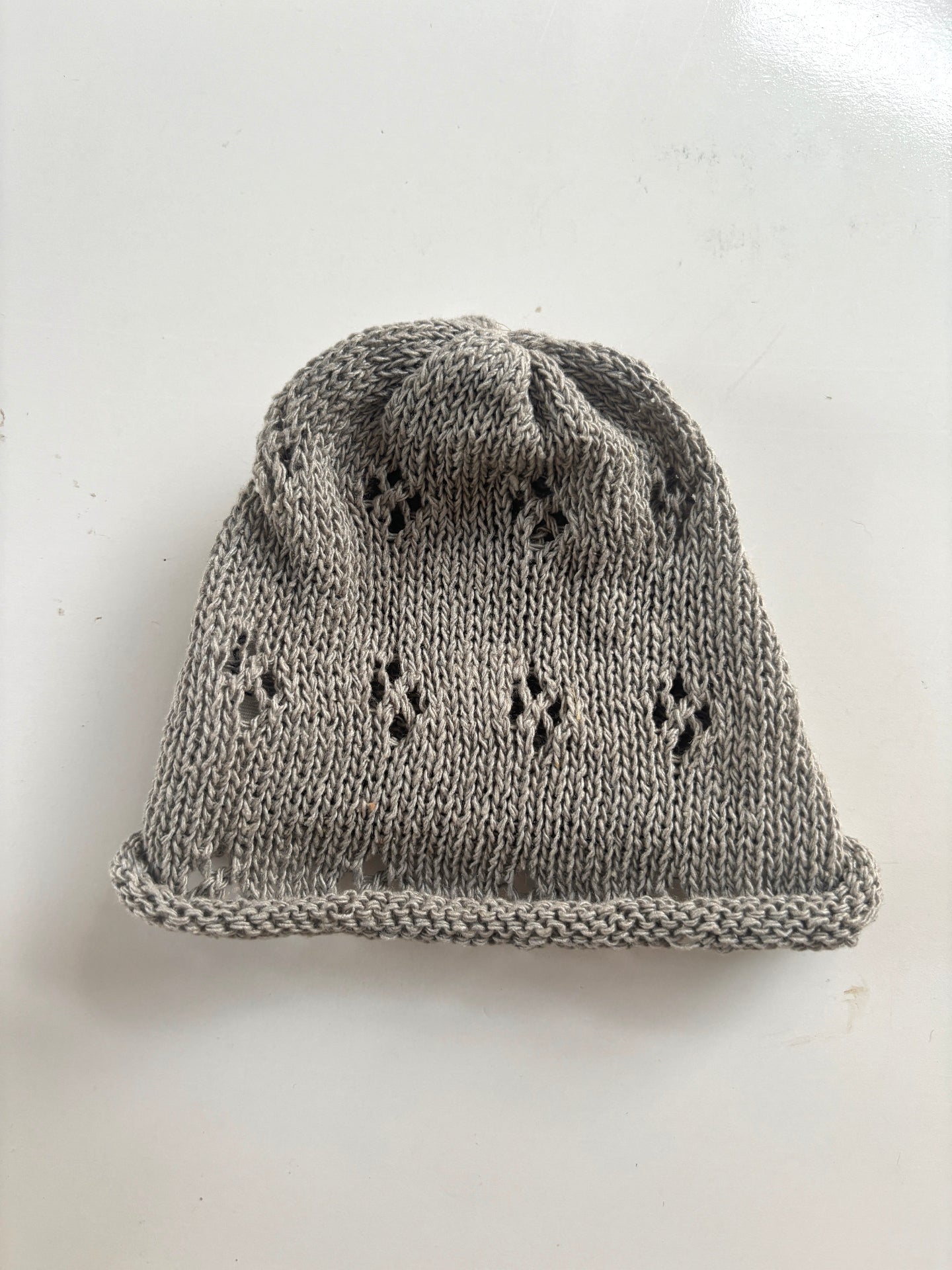 image shows organic natural grey sudha baby hat