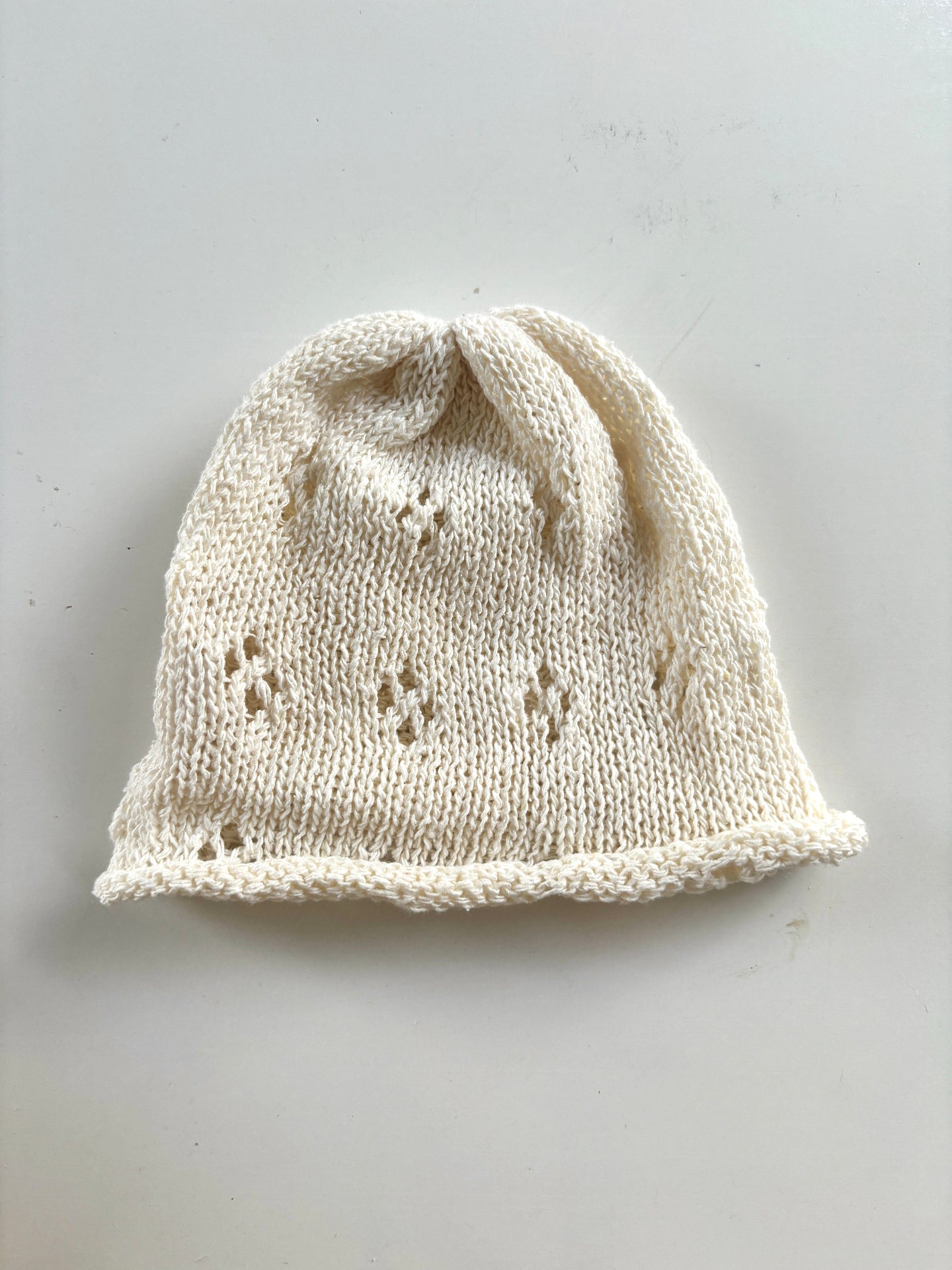 image shows organic silk cream sudha baby hat