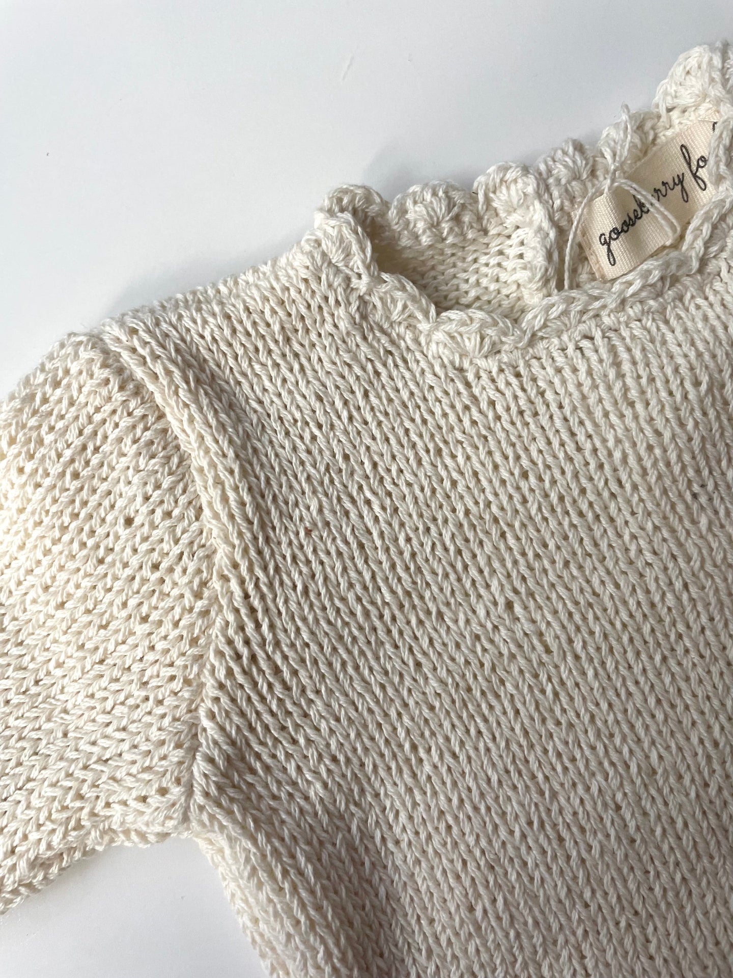 organic cotton cream scallop knit details